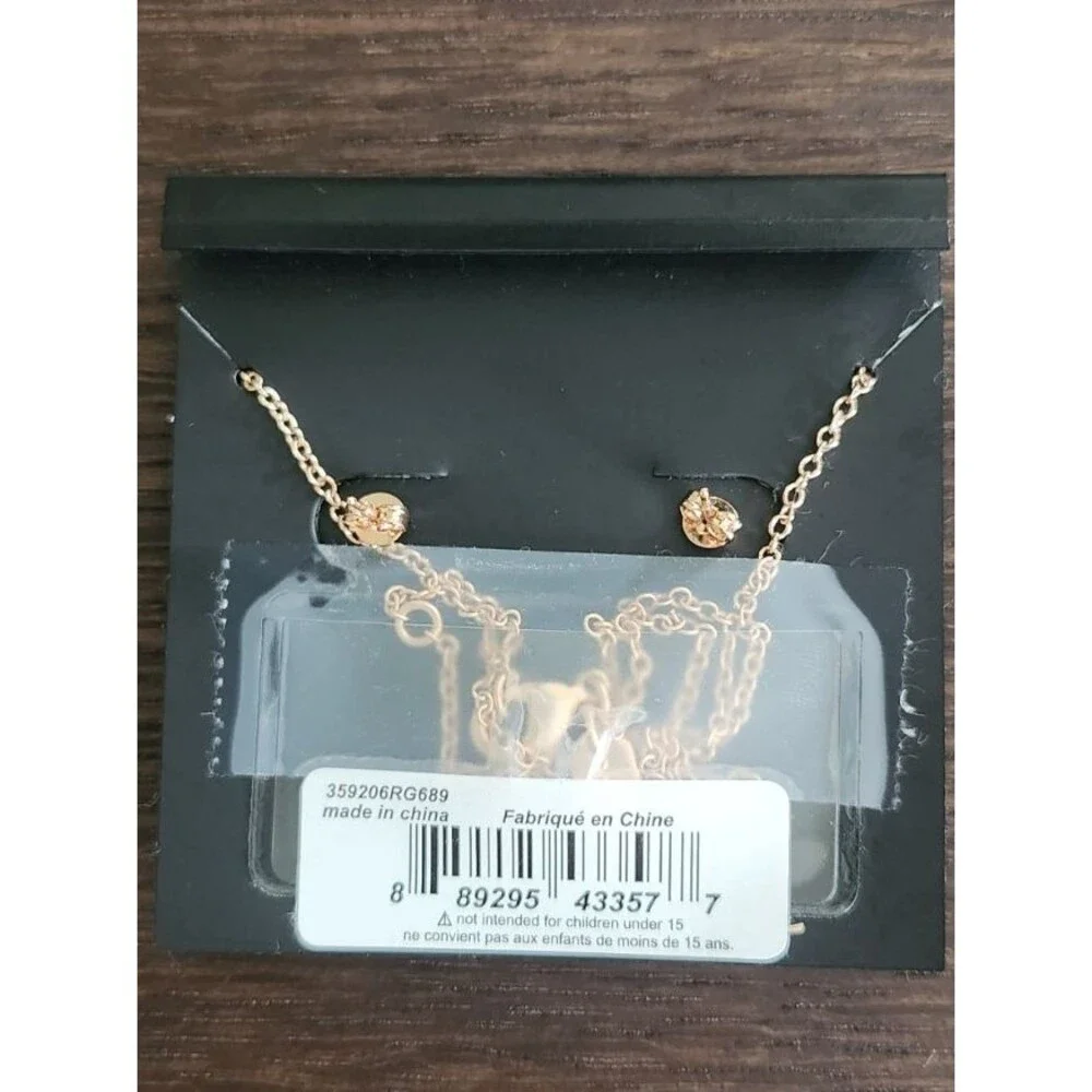 COACH Rose Gold Halo Necklace and Matching Flower Earring Set MSRP. $125